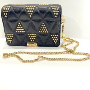 Micheal kors handbag Black and gold used once